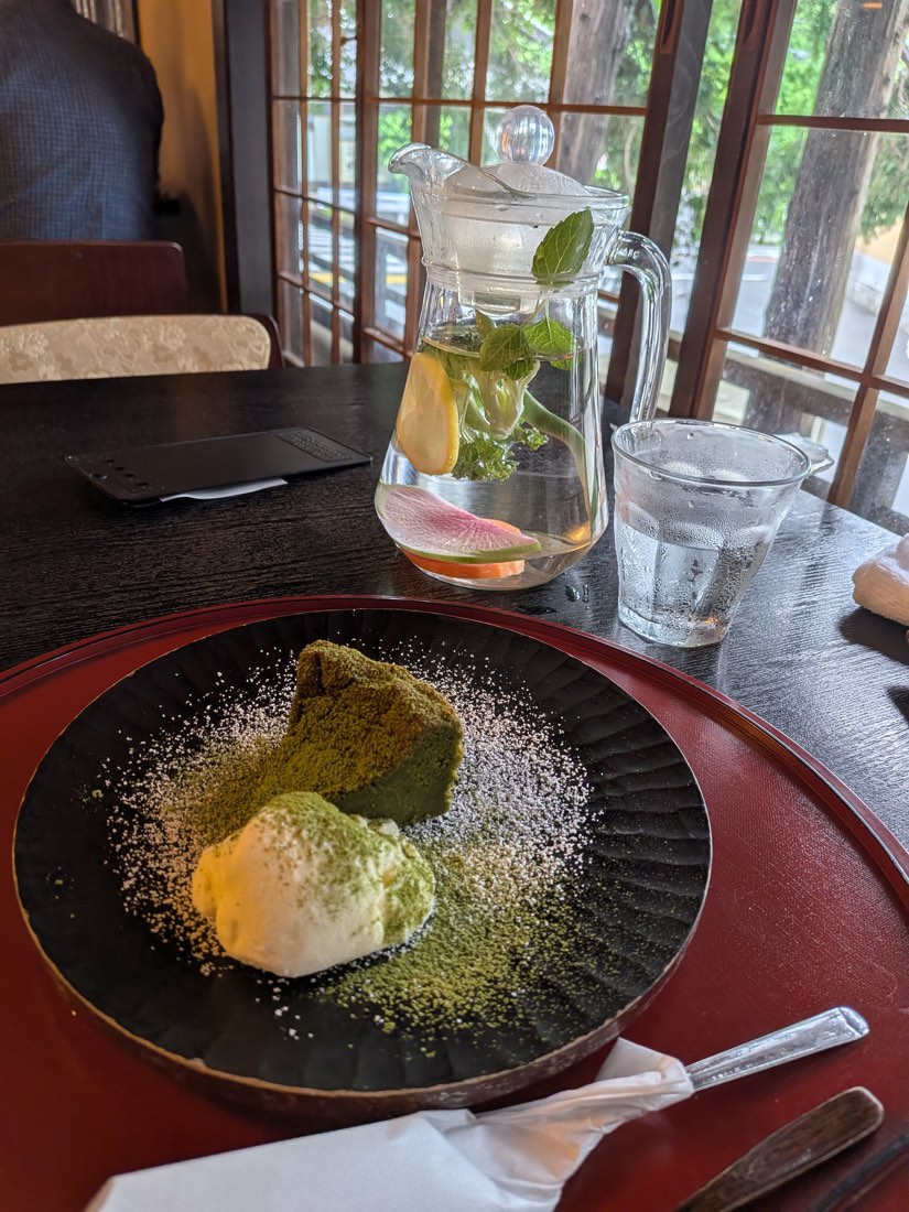Matcha dessert on a lacquer tray