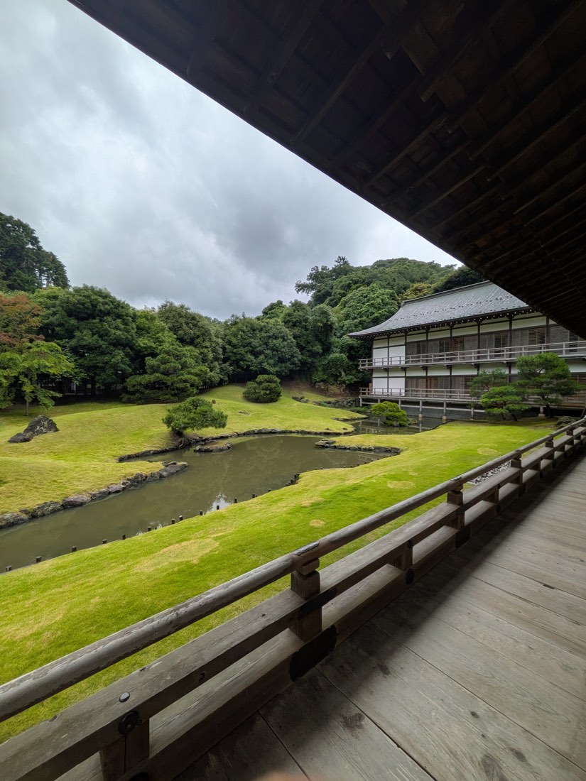 A temple veranda looking out over a garden
