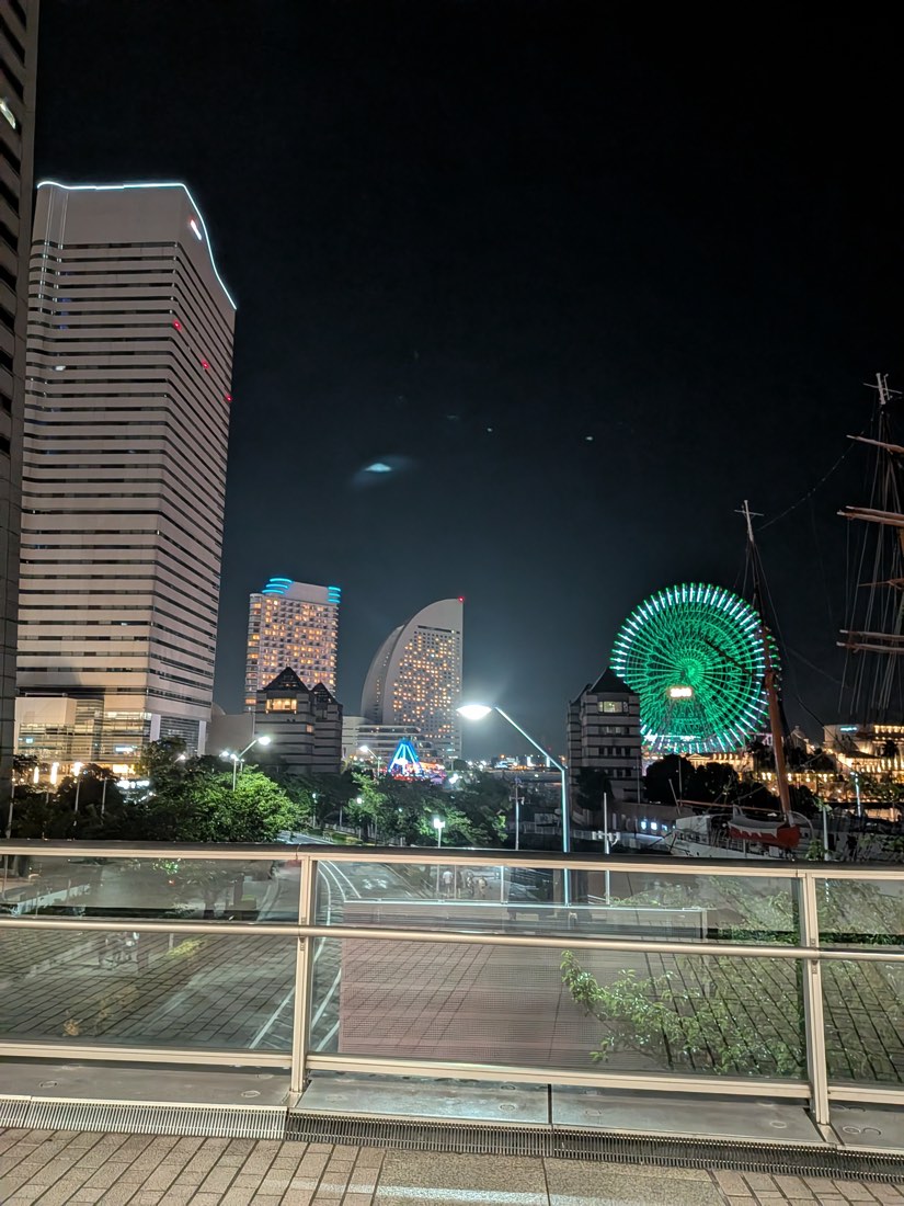 A waterfront walkway at night
