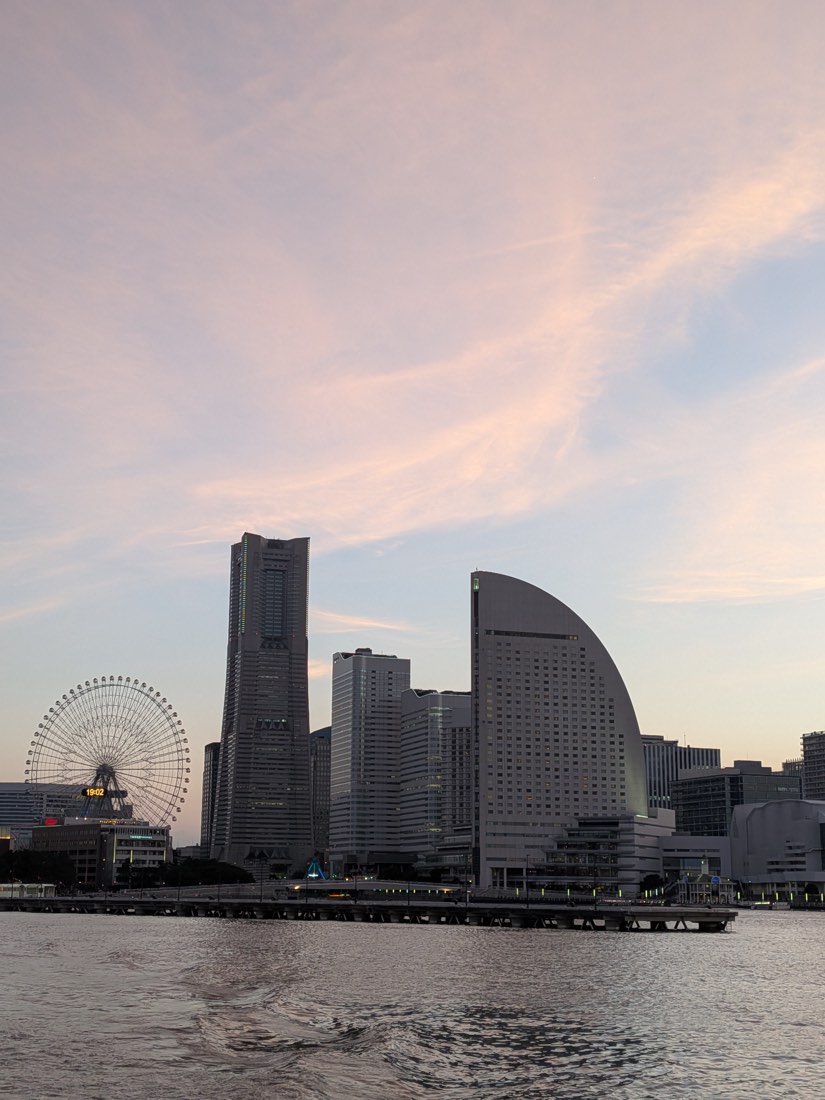 The Minato Mirai skyline across the water at dusk